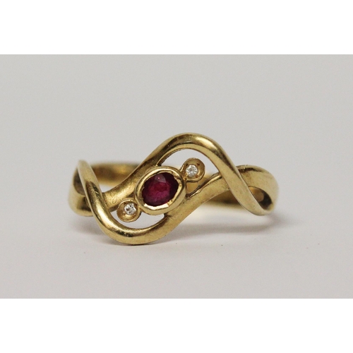 603 - 18ct yellow gold ruby and diamond dress ring, hallmarked, ring size Q, 3.9gms