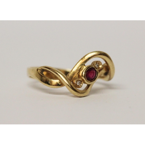 603 - 18ct yellow gold ruby and diamond dress ring, hallmarked, ring size Q, 3.9gms