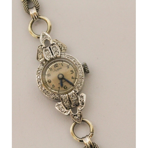 605 - Edwardian 9ct white gold and diamond ladies cocktail watch, the dial signed Mappin, gross weight 15.... 