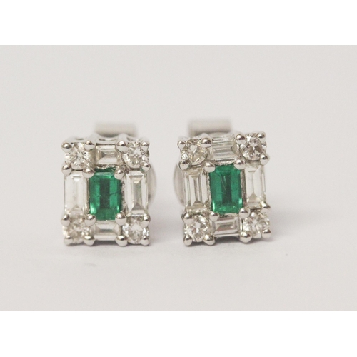 542 - Pair of emerald and baguette cut diamond ear studs, on 18ct white gold posts, hallmarked.