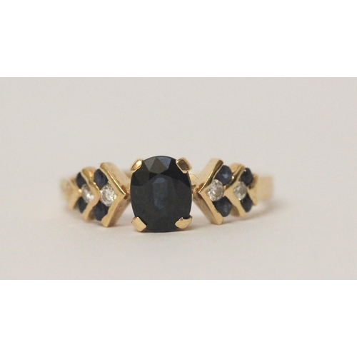 580 - 18ct gold sapphire and diamond dress ring, claw set central  sapphire on chevron design shoulders. S... 