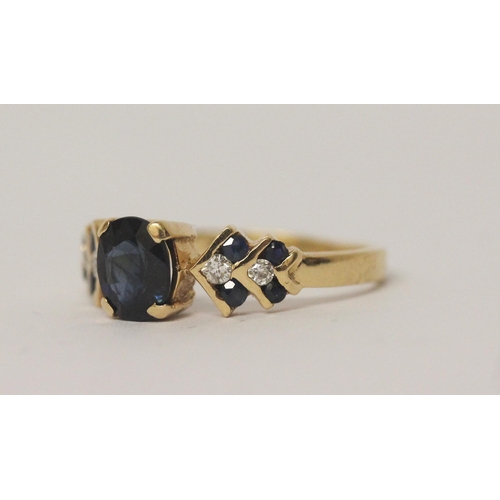 580 - 18ct gold sapphire and diamond dress ring, claw set central  sapphire on chevron design shoulders. S... 