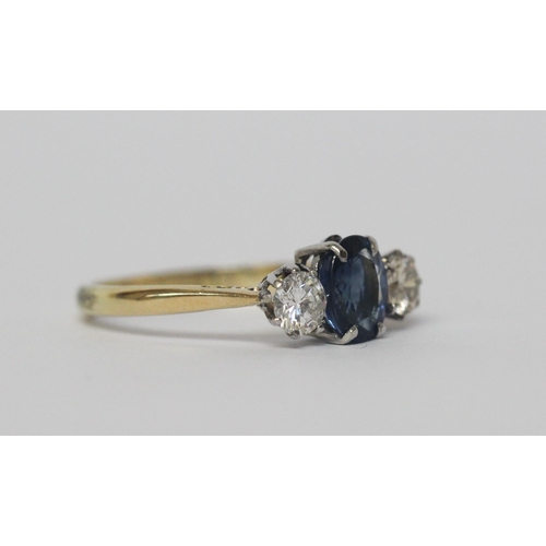 626 - A vintage sapphire and diamond three stone ring, on yellow gold band, marked 18ct & Plat. Ring size ... 