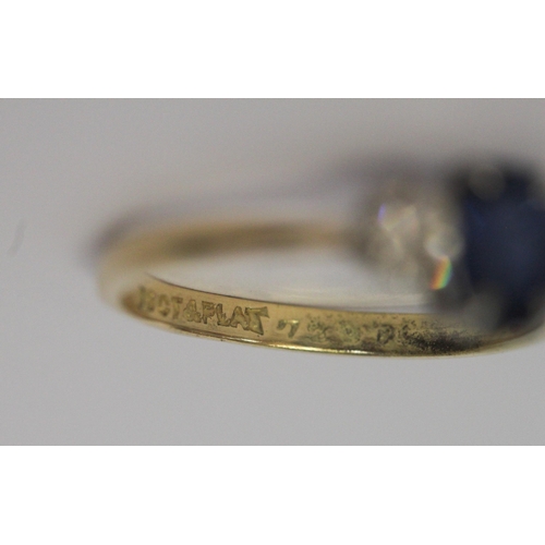 626 - A vintage sapphire and diamond three stone ring, on yellow gold band, marked 18ct & Plat. Ring size ... 