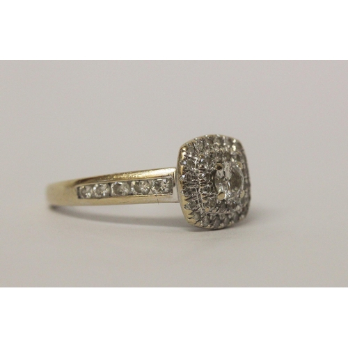 644 - A modern diamond halo cluster ring, diamond set shoulders, in hallmarked 18ct white gold, marked in ... 