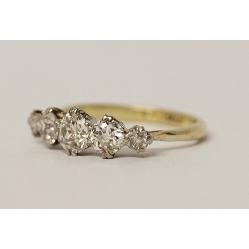 671 - A vintage five stone diamond ring, set with five graduated old brilliant cut diamonds, shank marked ... 