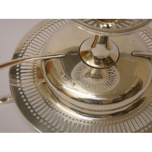 680 - A silver comport sweetmeat dish, with wide handles, pierced decoration. London 1909. Gross weight 9.... 