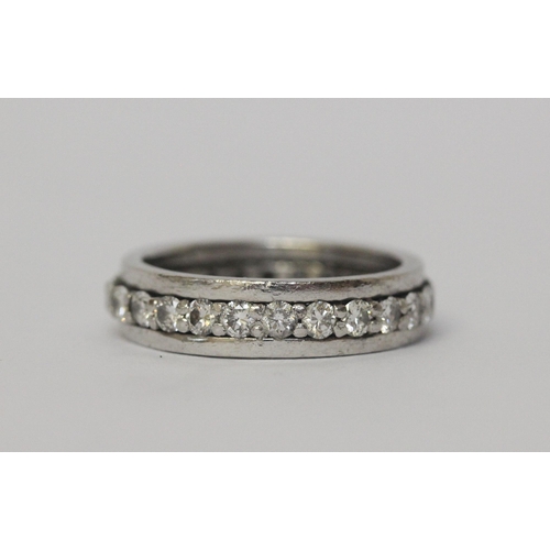 544 - Modern platinum and diamond full eternity ring, with brilliant cut diamonds, weight 9g. Ring size P