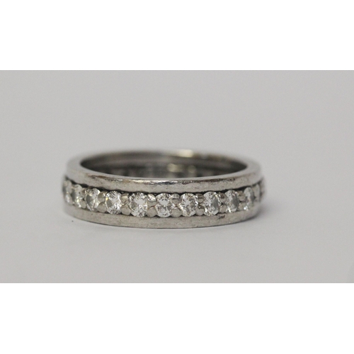 544 - Modern platinum and diamond full eternity ring, with brilliant cut diamonds, weight 9g. Ring size P