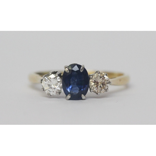 626 - A vintage sapphire and diamond three stone ring, on yellow gold band, marked 18ct & Plat. Ring size ... 