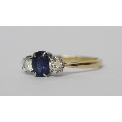 626 - A vintage sapphire and diamond three stone ring, on yellow gold band, marked 18ct & Plat. Ring size ... 