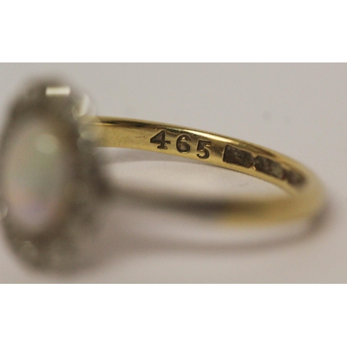 648 - Vintage opal and diamond oval cluster ring, shank marked 18ct & Plat. Ring size K