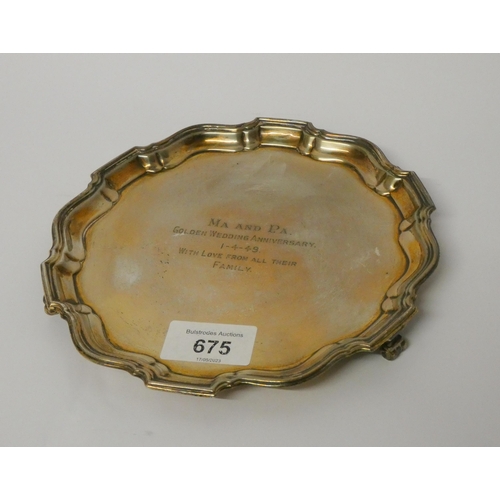 675 - A silver card waiter or small salver, with presentation inscription, Birmingham hallmarked 1933. Gro... 