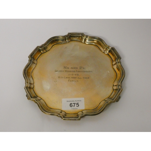 675 - A silver card waiter or small salver, with presentation inscription, Birmingham hallmarked 1933. Gro... 