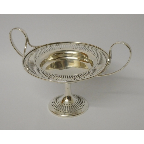 680 - A silver comport sweetmeat dish, with wide handles, pierced decoration. London 1909. Gross weight 9.... 