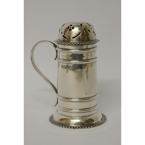 681 - A Victorian silver sugar sifter, of cylindrical form with pierced lid and scrolled handle. London 18... 