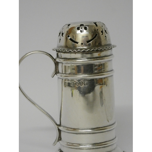 681 - A Victorian silver sugar sifter, of cylindrical form with pierced lid and scrolled handle. London 18... 