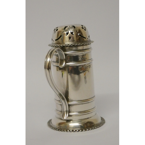 681 - A Victorian silver sugar sifter, of cylindrical form with pierced lid and scrolled handle. London 18... 