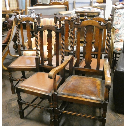 61 - A set of four oak barley twist framed dining chairs and one matching carver