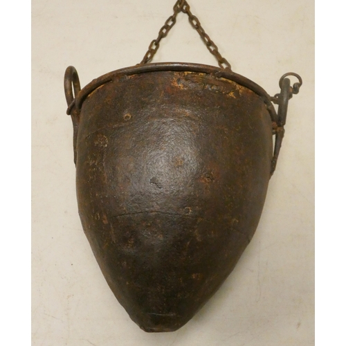 733 - A small steel hanging pot complete with hook and chain