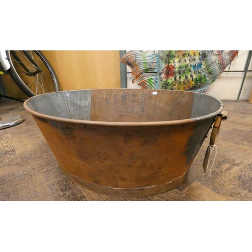 742 - An oval galvanised twin handled planter