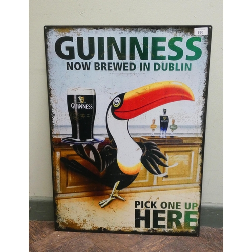 773 - An enamelled Guinness now brewed in Dublin sign measuring approximately 27