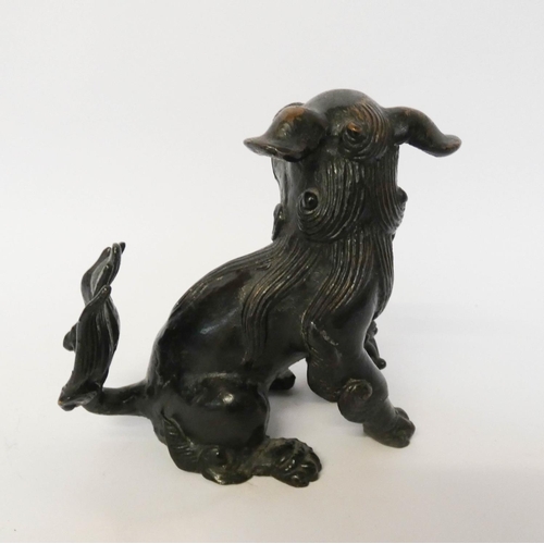 167 - A bronze Japanese temple dog, 12cms tall