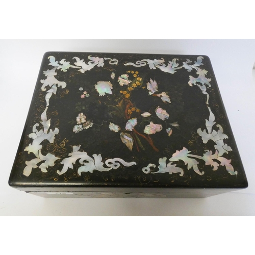 170 - A Victorian black lacquer and Mother of Pearl inlaid ladies travelling vanity case with various silv... 