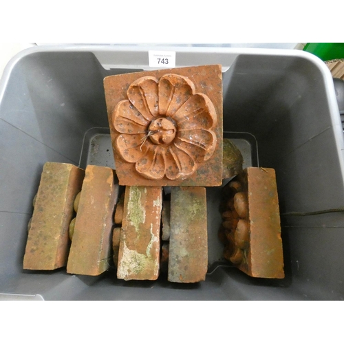 743 - Seven terracotta ornate floral edging tiles