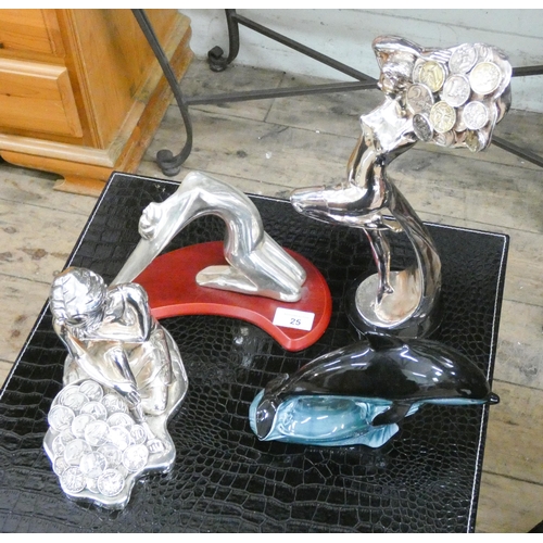 25 - Three modern metal lady figure ornaments and a Poole Pottery dolphin, two of the figures are Special... 