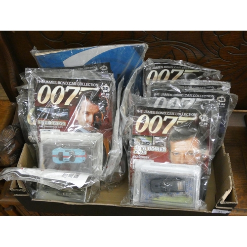 31 - Thirteen pieces of the James Bond 007 car collection - still in packs