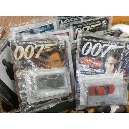 34 - Twelve pieces of the James Bond 007 car collection - still in packs