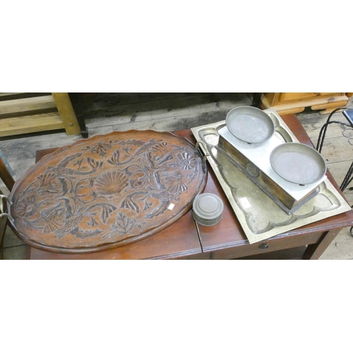 5 - An oval carved hardwood two handled tray, a brass tray and a set of scales with weight