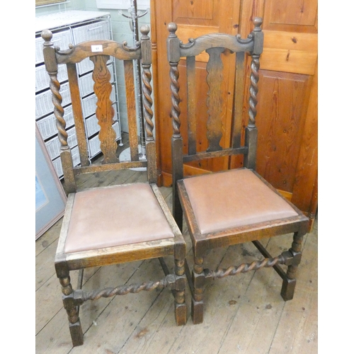 61 - A set of four oak barley twist framed dining chairs and one matching carver