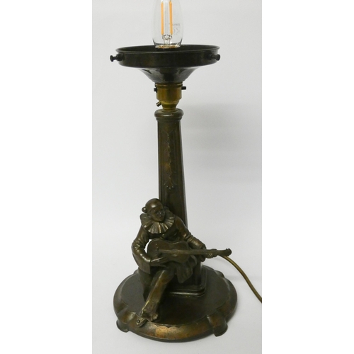 156 - An Art Deco spelter table lamp base modelled as a Piero musician