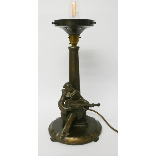 156 - An Art Deco spelter table lamp base modelled as a Piero musician