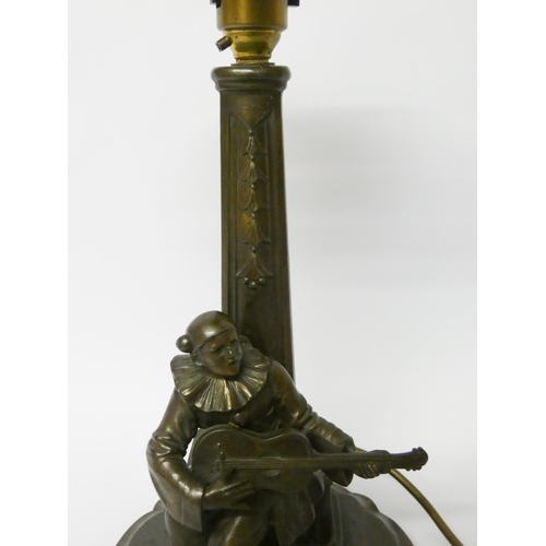 156 - An Art Deco spelter table lamp base modelled as a Piero musician