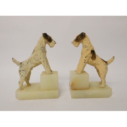 159 - A pair of Art Deco cold painted spelter bookends depicting terriers