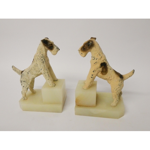 159 - A pair of Art Deco cold painted spelter bookends depicting terriers