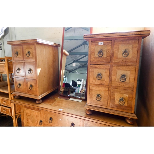 105 - A pair of matching Spanish style lamp tables or bedside tables each fitted six drawers