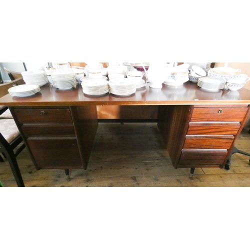 125 - A mid-20th century mahogany twin pedestal desk