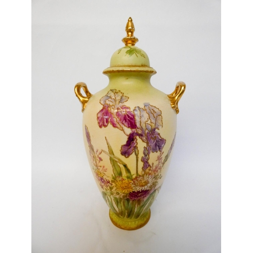 163 - Twin handled twin pottery vase and cover decorated with Iris, impressed marks to the base, 37cms tal... 