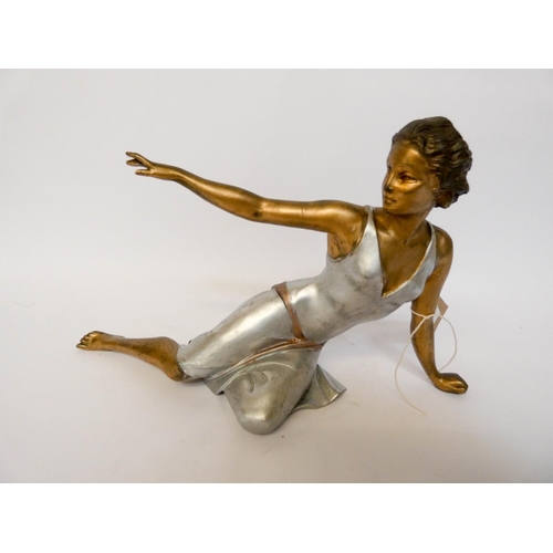 177 - A Art Deco coloured spelter figure of a seated lady