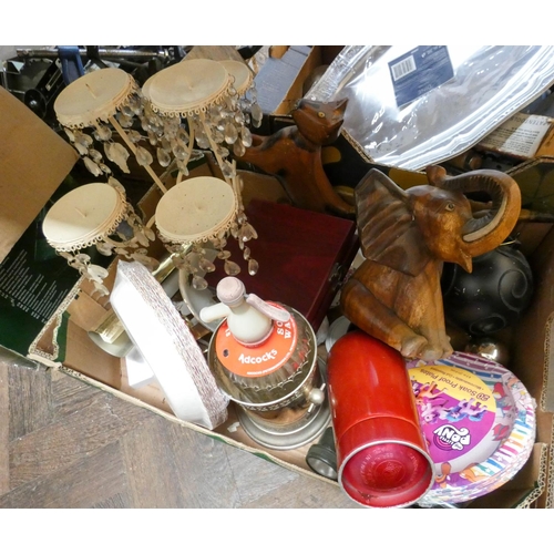 750 - A large box containing candle holders, soda siphons, wine bottle holder, wooden elephant ornaments e... 