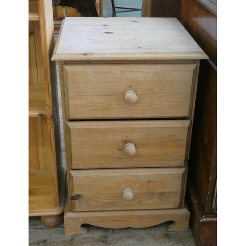 87 - A pine three drawer bedside chest