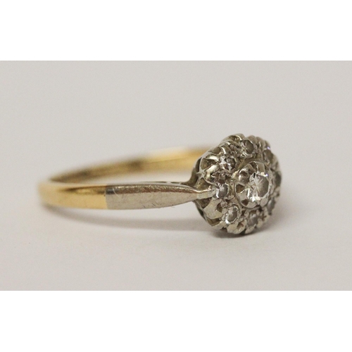 466 - Vintage diamond cluster ring, on 18ct gold band, marked 18ct & Plat, ring size J/K