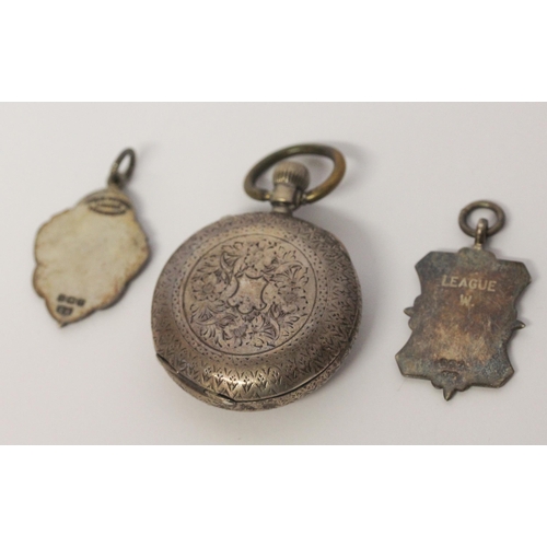 452 - Victorian silver ladies fob watch and two silver sporting medallions