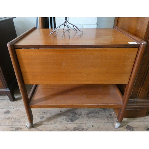 148 - A two tier teak drop leaf tea trolley