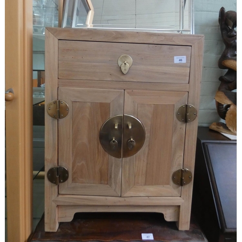 46 - A Chinese style bedside cabinet or lamp table fitted drawer with brass fittings