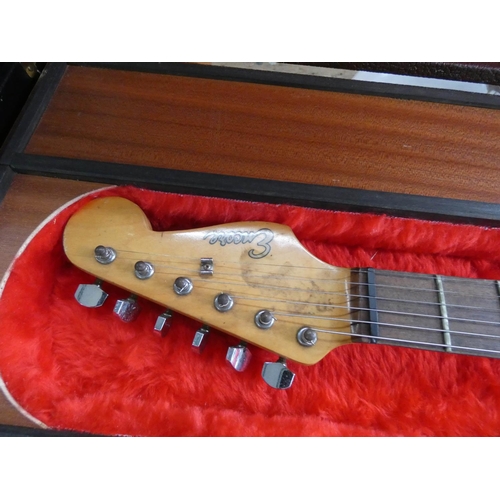 72 - An Encore six string electric guitar in hard carrying case